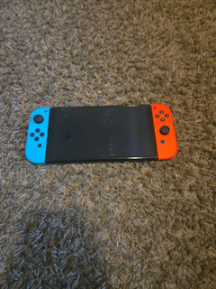 Nintendo Switch OLED with Games and Accessories