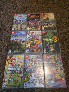 Nintendo Switch OLED with Games and Accessories - Image 2