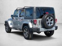 2012 Jeep Wrangler Unlimited Sahara 4x4 4WD SUV AUTONATION Call (442) 333-6602 to confirm availability - March 17th - Image 9