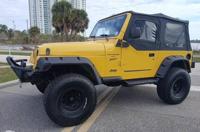 1999 JEEP WRANGLER TJ - 4.0L V6 MANUAL - ALL NEW SUSPENSION DAYTONA BEACH - REDS & BLUES - Image 2