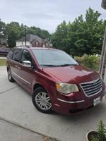 2010 Chrysler town and country Covington - Image 3