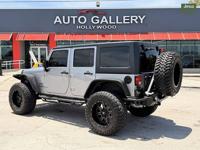 2015 Jeep Wrangler Unlimited Sport lift kit and much more SUV BEAUTI Auto Gallery buy sell trade consignment - Image 4