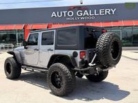 2015 Jeep Wrangler Unlimited Sport lift kit and much more SUV BEAUTI Auto Gallery buy sell trade consignment - Image 6