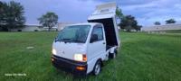 # 57 1998 Mitsubishi Mini Cab Dump PTO,4X4,AC
