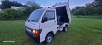 # 55 1996 Daihatsu Hijet Dump 4X4,AC, PS,automatic transmission