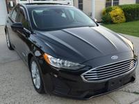 Check Out This Spotless 2019 Ford Fusion Hybrid with 92,983 Miles-long Freeport - Image 2