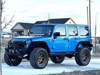 2014 Jeep Wrangler Unlimited Sahara - Image 2
