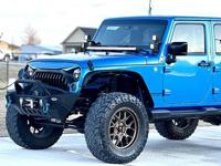 2014 Jeep Wrangler Unlimited Sahara - Image 3