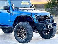 2014 Jeep Wrangler Unlimited Sahara - Image 5