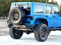 2014 Jeep Wrangler Unlimited Sahara - Image 9