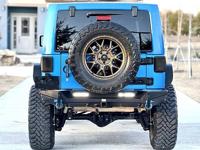 2014 Jeep Wrangler Unlimited Sahara - Image 10