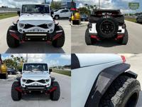 This 2016 Jeep Wrangler Unlimited over on accessories Sport S Auto Gallery buy sell trade consignment - Image 4