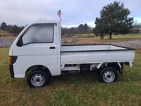 # 19 1994 DAIHATSU HIJET 4X4, HI-LO, 5 SPEED. ONLY 8,700 MILES