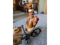 vintage-display-ice-cream-cart-on-a-tricycle-with-vendor-small-5