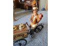 vintage-display-ice-cream-cart-on-a-tricycle-with-vendor-small-2